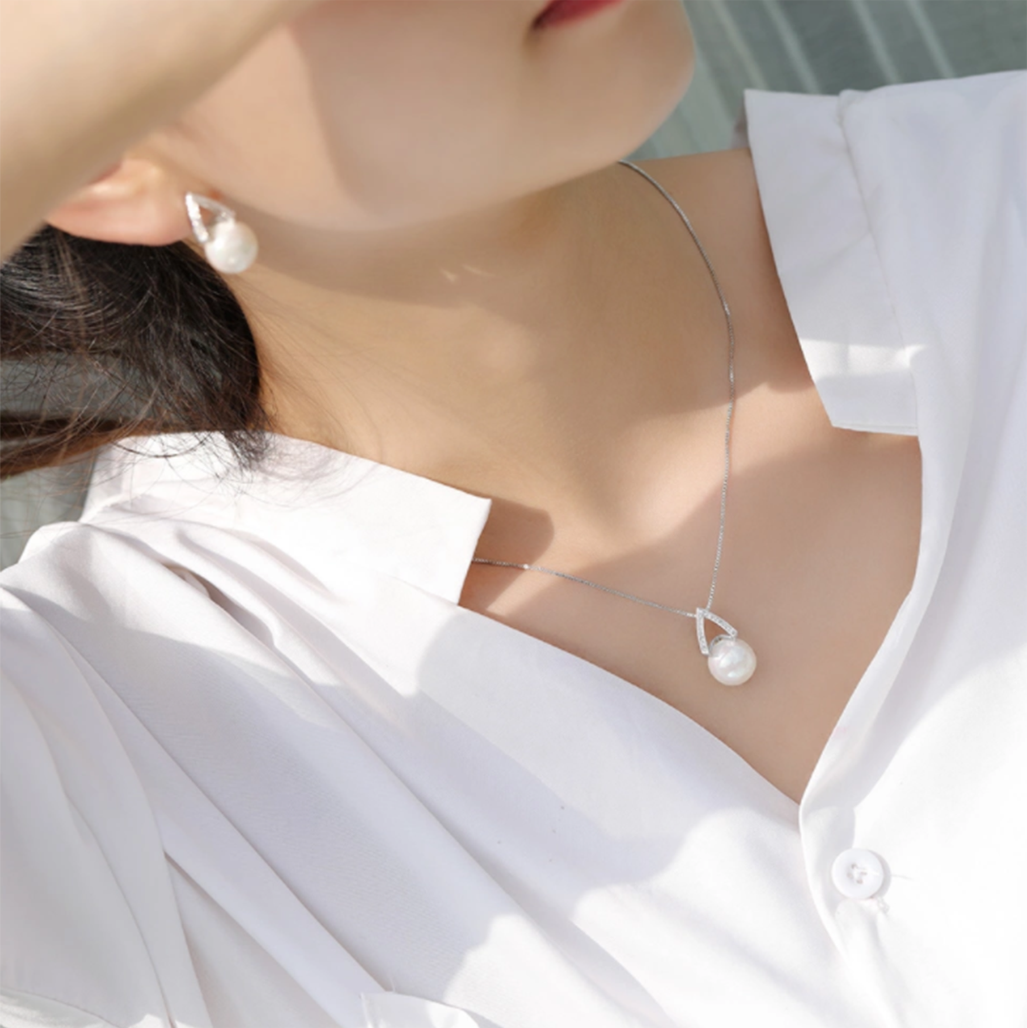 White Pearl Drop Earrings Model